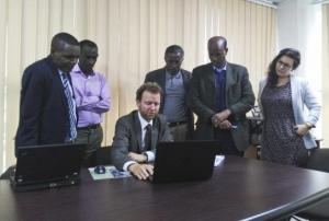 UN-SPIDER mission team presents on GIS and remote sensing for disaster managment to the National Disaster Risk Reduction Commission.